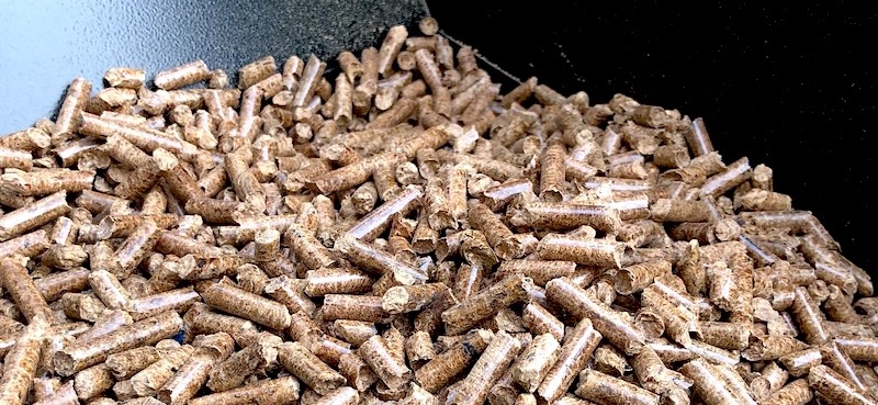 Wood pellets in Z Grills smoker hopper